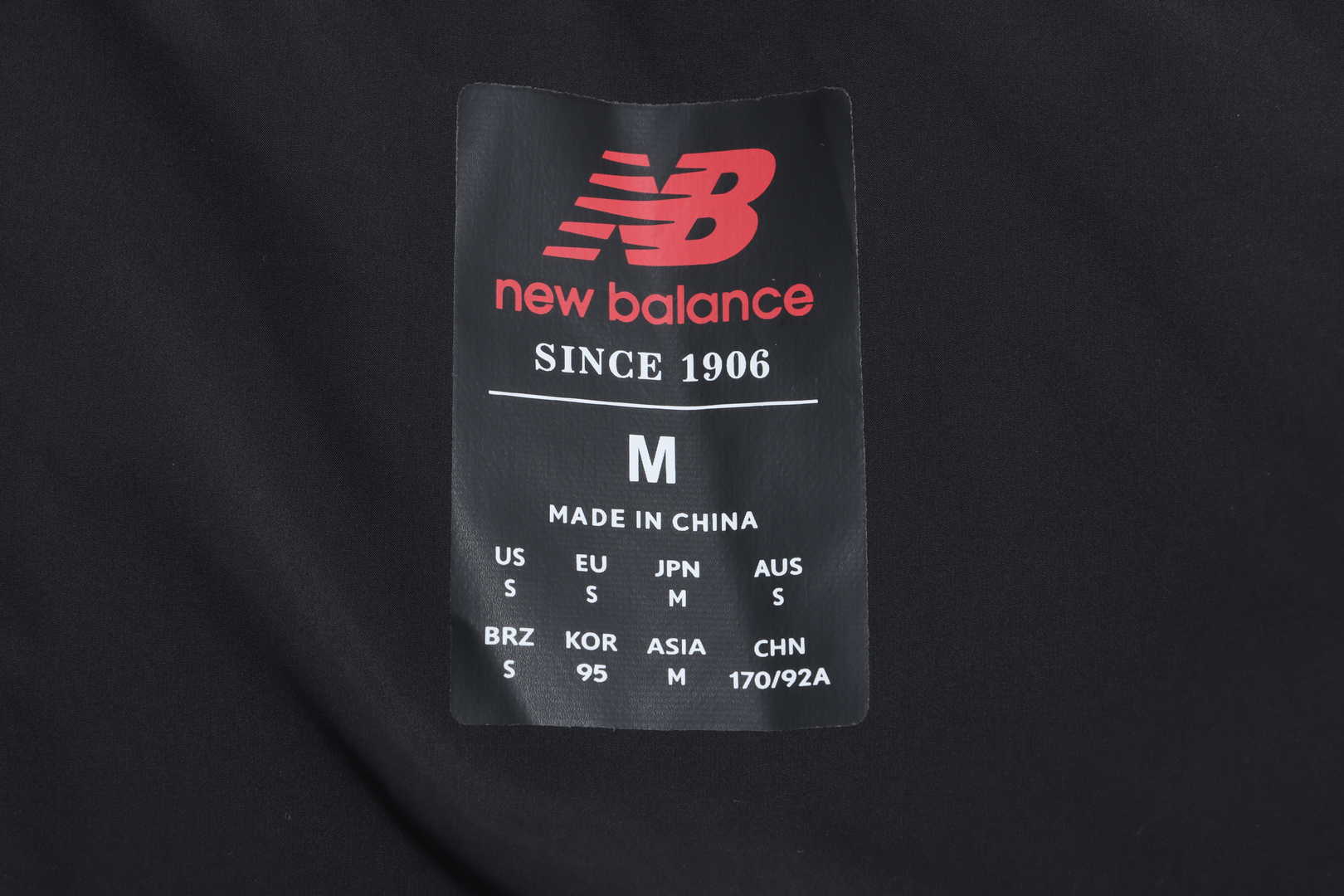 NEW BALANCE solid color large pocket down jacket